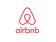 Airbnb logo with a stylized "A" formed by loops and the word "airbnb" in lowercase red font below