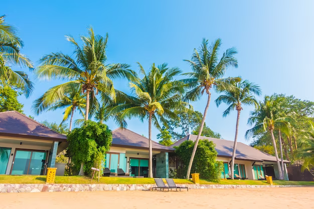 Island with houses with palm trees